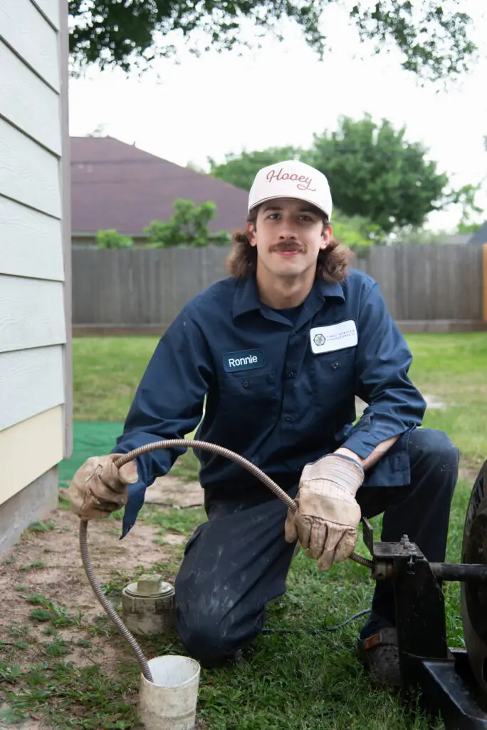 First Service Plumber working
